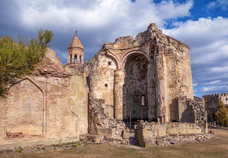 Ruined stone church and old bell tower