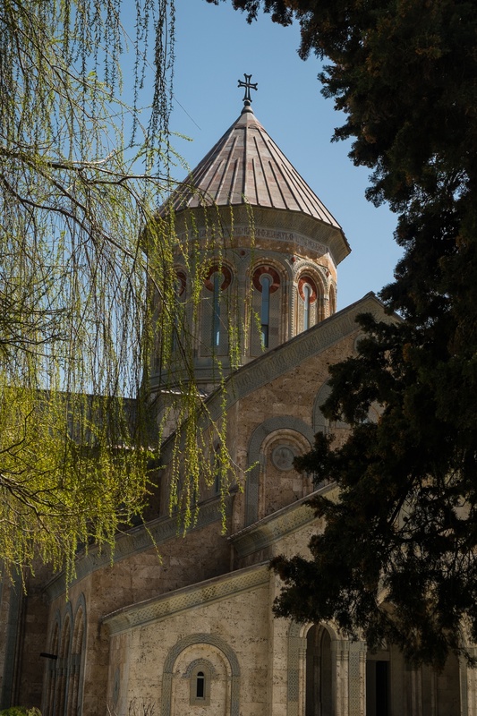 Bodbe monastery church amid trees