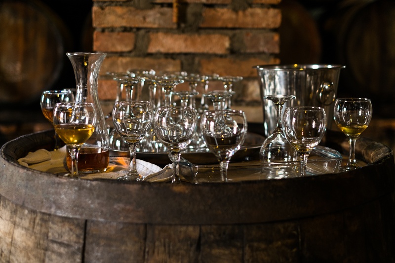 Set of tasting glasses on a barrel